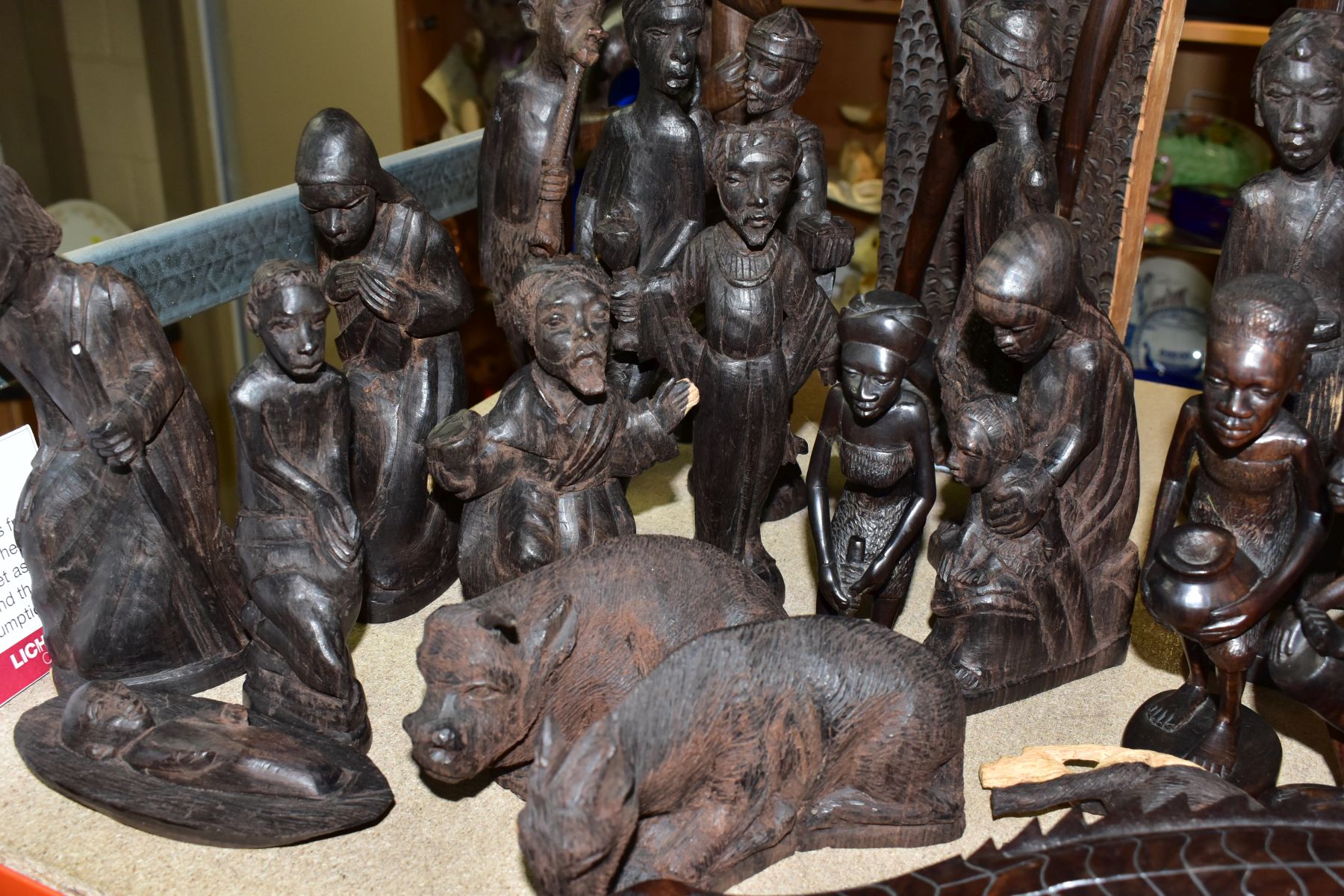 A GROUP OF CARVED HARDWOOD AFRICAN FIGURES, to include a nativity set from Dar-es-Salaam, - Image 4 of 16