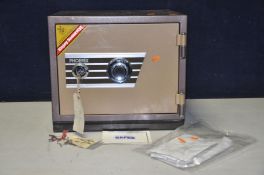 A PHEONIX SAFE model No MC350 with a dual guard locking system, key and combination lock comes