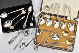 AN ASSORTMENT OF SILVER SPOONS AND SUGAR TONGS, to include a set of six teaspoons with apostles to