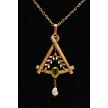 AN EDWARDIAN PENDANT AND CHAIN, a yellow gold triangular openwork pendant with cross detail at the