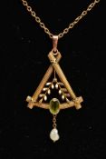 AN EDWARDIAN PENDANT AND CHAIN, a yellow gold triangular openwork pendant with cross detail at the