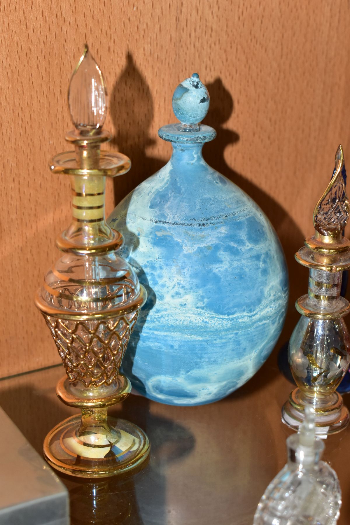 A COLLECTION OF 19TH AND 20TH CENTURY PERFUME BOTTLES , SPARE STOPPERS AND A FUNNEL, mostly glass, - Image 11 of 16