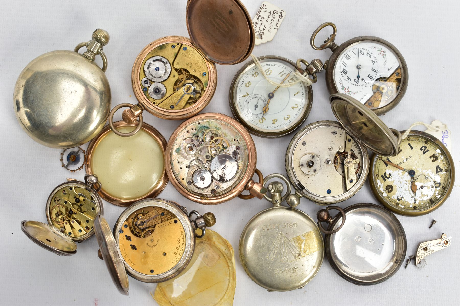 A SELECTION OF POCKET WATCHES, to include a small silver open face watch with a white dial, Roman - Image 6 of 8