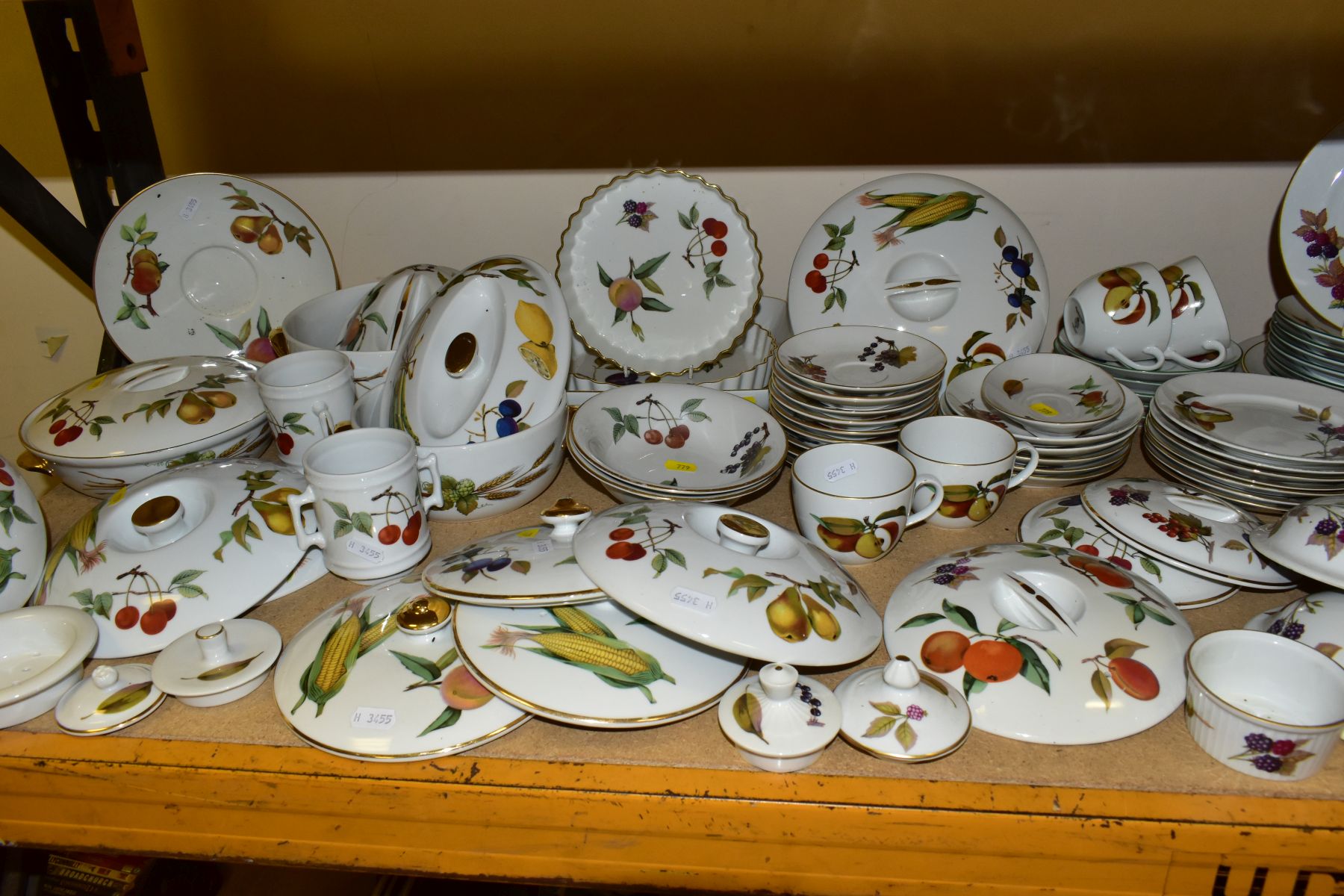 SEVENTY TWO PIECES OF ROYAL WORCESTER EVESHAM AND EVESHAM VALE DINNER WARES, comprising two flan