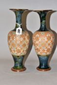 A PAIR OF ROYAL DOULTON SLATERS PATENT BALUSTER VASES, flared blue rim above a mottled blue /