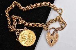 A 9CT GOLD CHARM BRACELET WITH A MOUNTED HALF SOVEREIGN, a yellow gold fancy link chain fitted