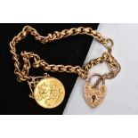 A 9CT GOLD CHARM BRACELET WITH A MOUNTED HALF SOVEREIGN, a yellow gold fancy link chain fitted