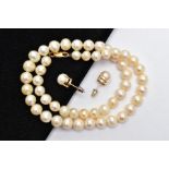 A CULTURED PEARL NECKLACE AND A PAIR OF EARRINGS, the graduated pearl necklace of baroque and