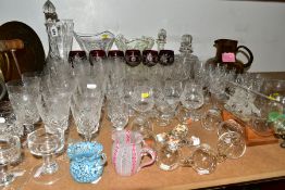 A GROUP OF CUT CRYSTAL AND OTHER GLASSWARES, to include a Nuutajärvi Finnish brown glass jug