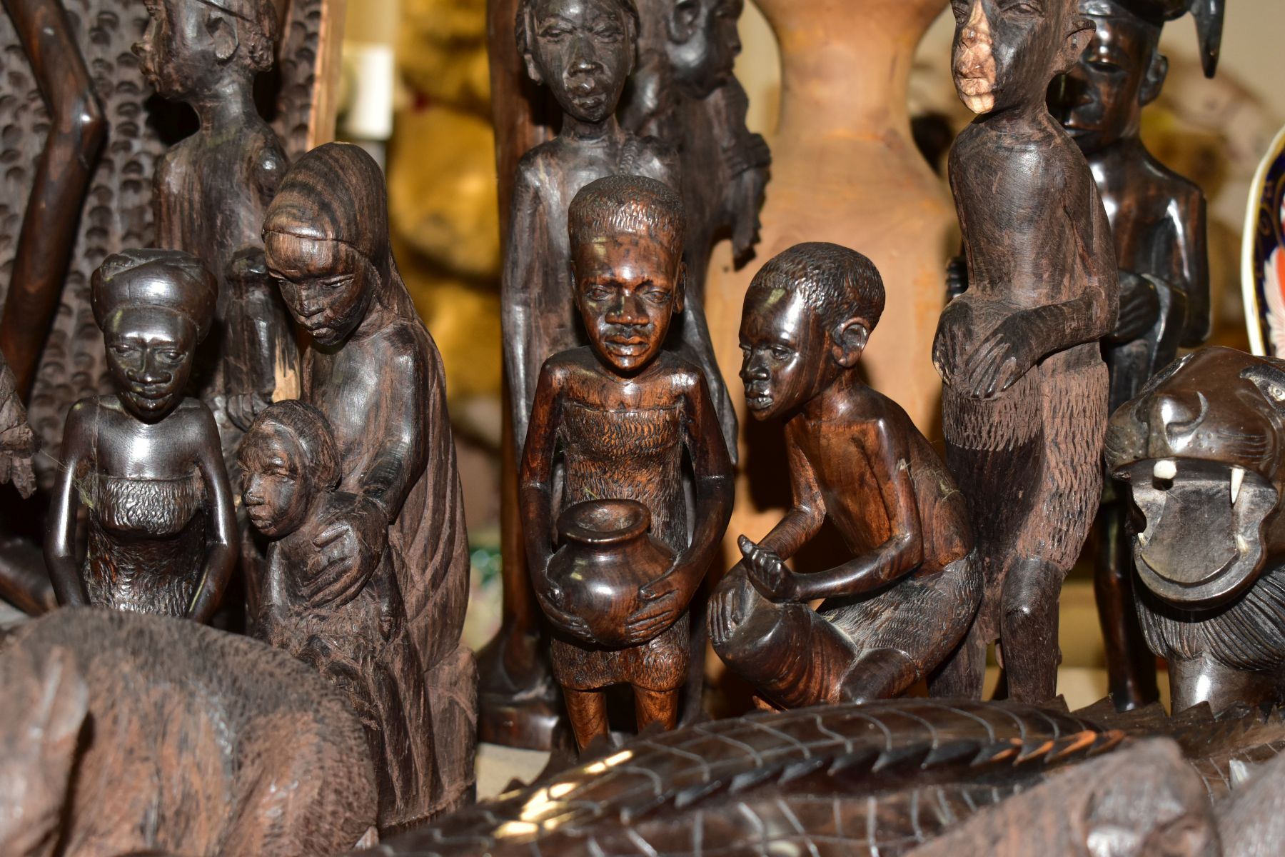 A GROUP OF CARVED HARDWOOD AFRICAN FIGURES, to include a nativity set from Dar-es-Salaam, - Image 12 of 16