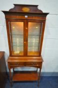 A BRADLEY YEW WOOD TWO DOOR DISPLAY CABINET, over a base with two drawers, width 67cm x depth 33cm x