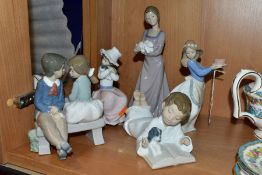 FIVE NAO PORCELAIN FIGURES OF CHILDREN, four of them modelled with their pets, the fifth modelled as
