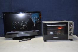 A HITACHI 26in TV model No L26DN04U with remote and a Morphy Richards rotisserie mini oven model