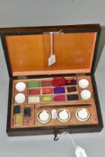 A VICTORIAN RECTANGULAR ROSEWOOD AND BRASS INLAID ARTIST'S PAINT BOX, fitted with compartments