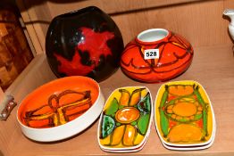 SEVEN PIECES OF POOLE POTTERY, six from the Delphis range, comprising four rectangular pin dishes,