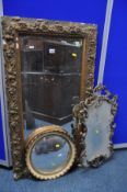 A DISTRESSED GILT GESSO FRENCH BEVELLED EDGE WALL MIRROR, 59cm x 108cm, a foliate framed wall mirror