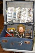 A SUITCASE CONTAINING ASSORTED TOYS, to include Mettoy tinplate tipping trailer, part boxed Del