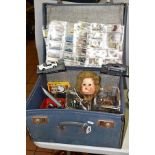 A SUITCASE CONTAINING ASSORTED TOYS, to include Mettoy tinplate tipping trailer, part boxed Del