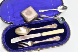 AN ASSORTMENT OF SILVER ITEMS, to include an incomplete cased cutlery set, a spoon and fork engraved