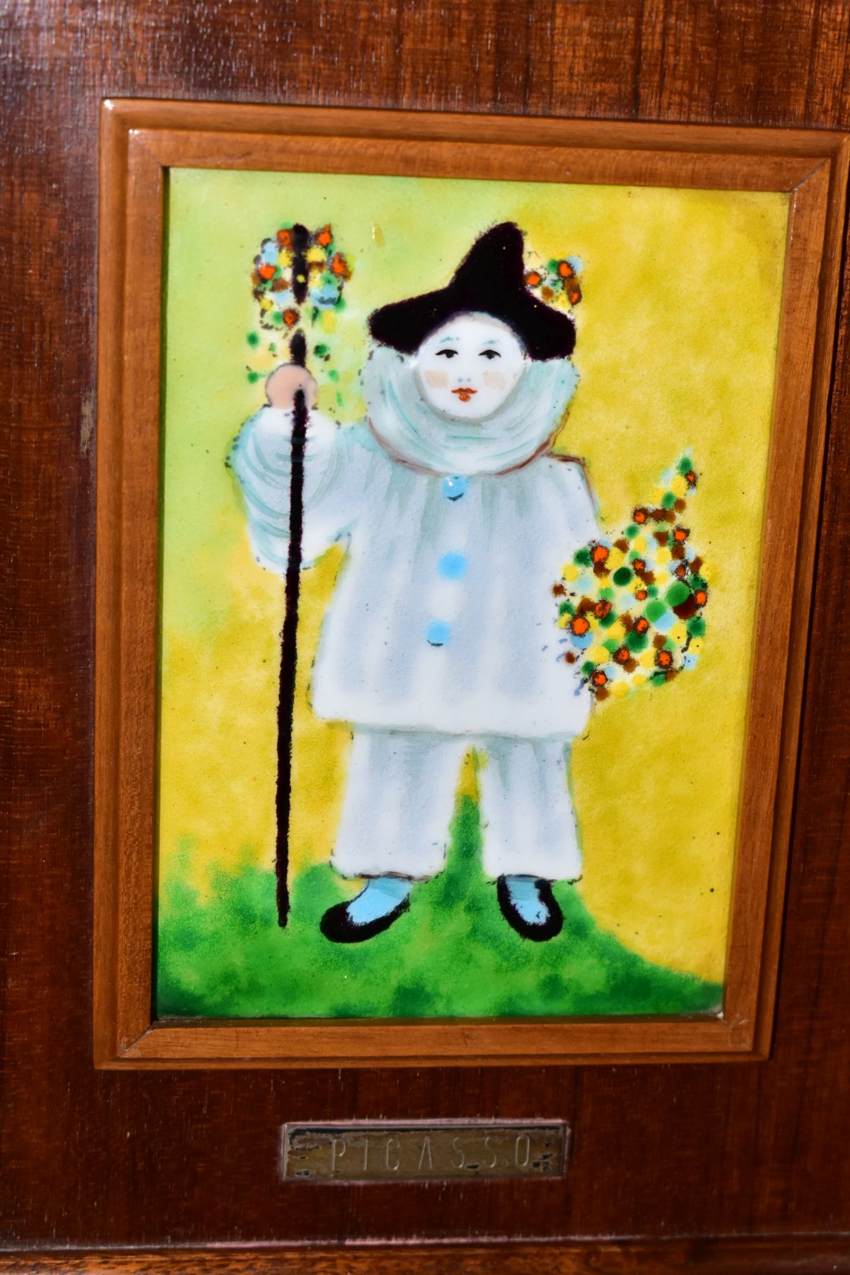AFTER PABLO PICASSO 'PAUL AS PIERROT', a wood framed enamel plaque depicting the artists son dressed - Image 4 of 4