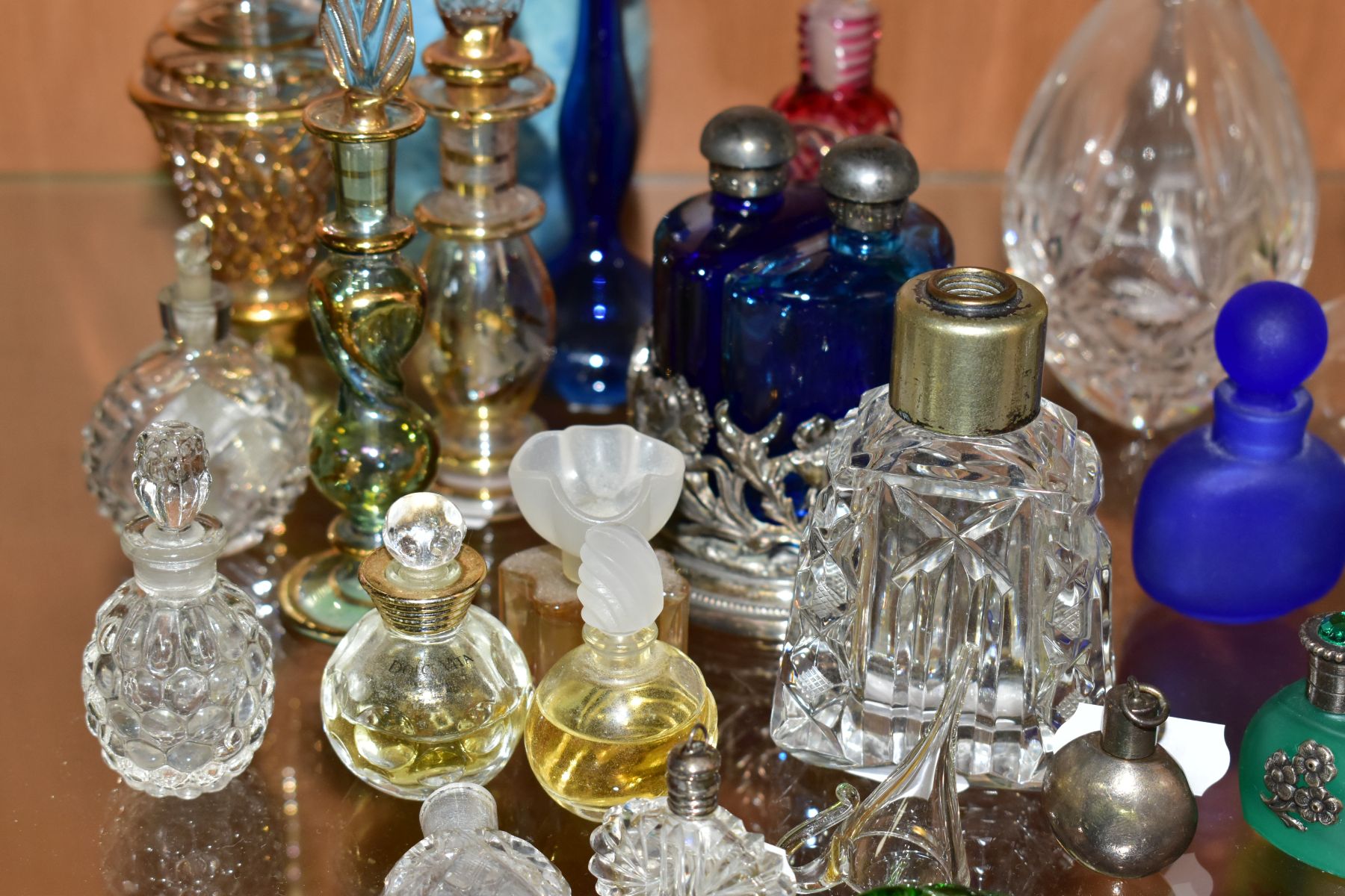 A COLLECTION OF 19TH AND 20TH CENTURY PERFUME BOTTLES , SPARE STOPPERS AND A FUNNEL, mostly glass, - Image 3 of 16