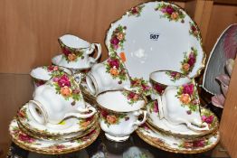A ROYAL ALBERT OLD COUNTRY ROSES PATTERN TEA SET, comprising a twin handled bread and butter