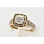 A 9CT GOLD CUBIC ZIRCONIA RING, a circular cut cubic zirconia, set within a squared halo of circular