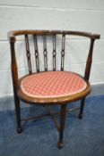 AN EDWARDIAN MAHOGANY BOW BACK ARMCHAIR