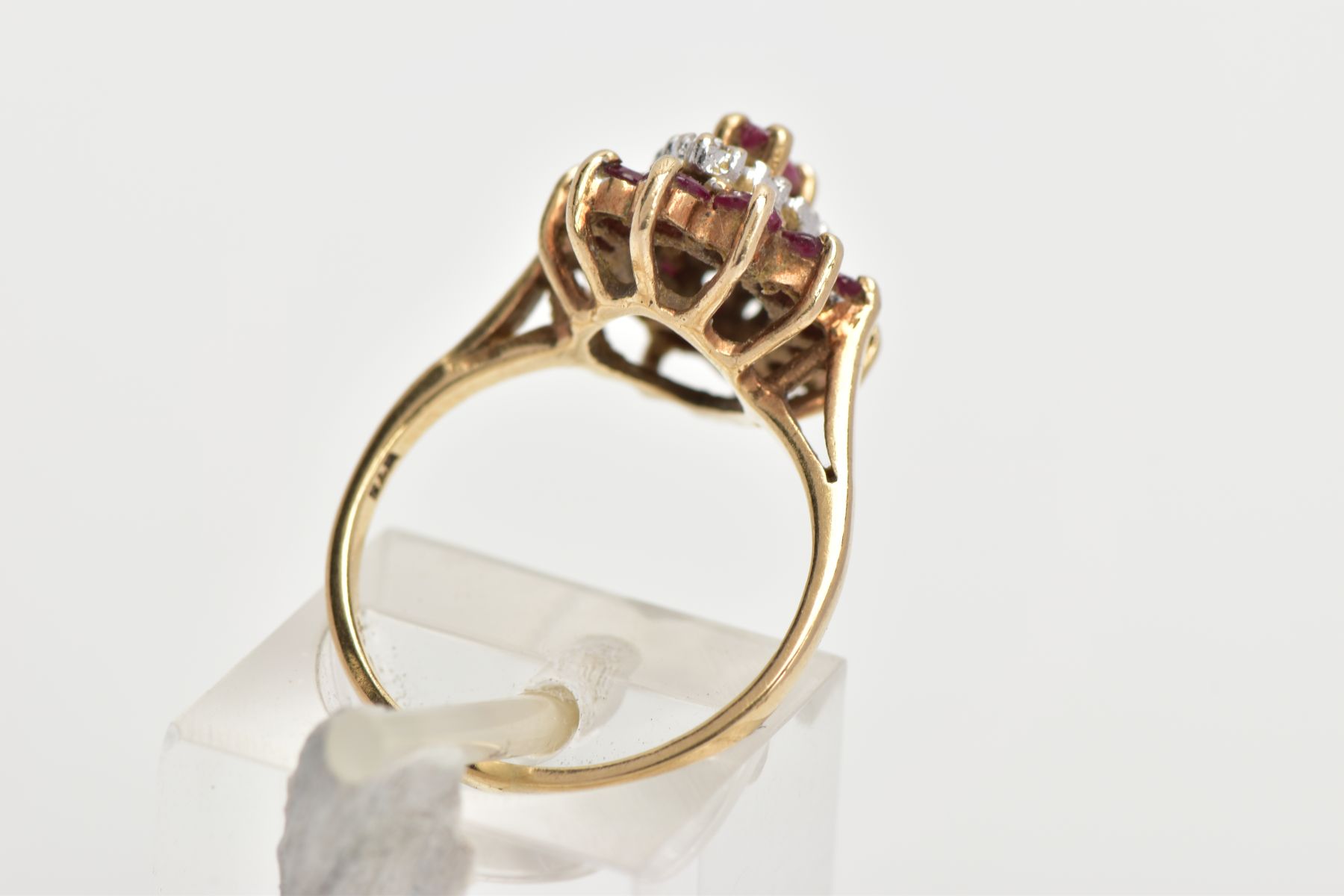 A 9CT GOLD RUBY AND DIAMOND CLUSTER RING, slightly raised cluster of a navette form, set with a - Image 3 of 4