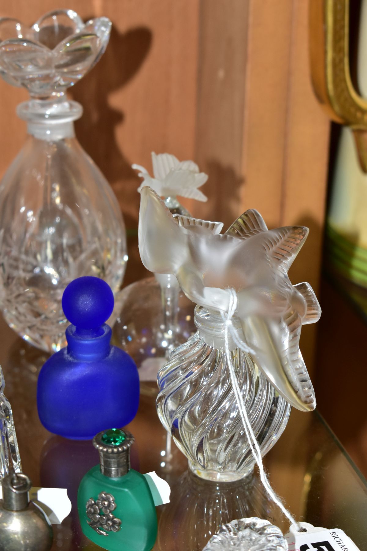 A COLLECTION OF 19TH AND 20TH CENTURY PERFUME BOTTLES , SPARE STOPPERS AND A FUNNEL, mostly glass, - Image 4 of 16