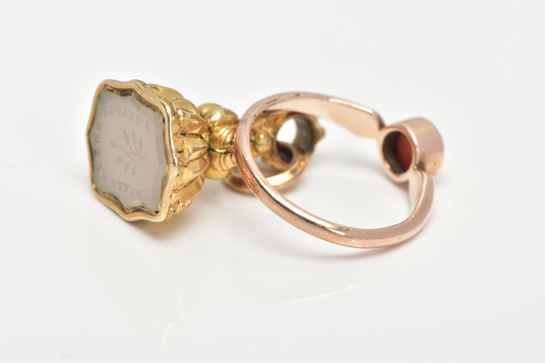 A CORAL RING AND INTAGLIO FOB, a round cabochon coral stone milgrain set in a rose metal mount, - Image 4 of 4