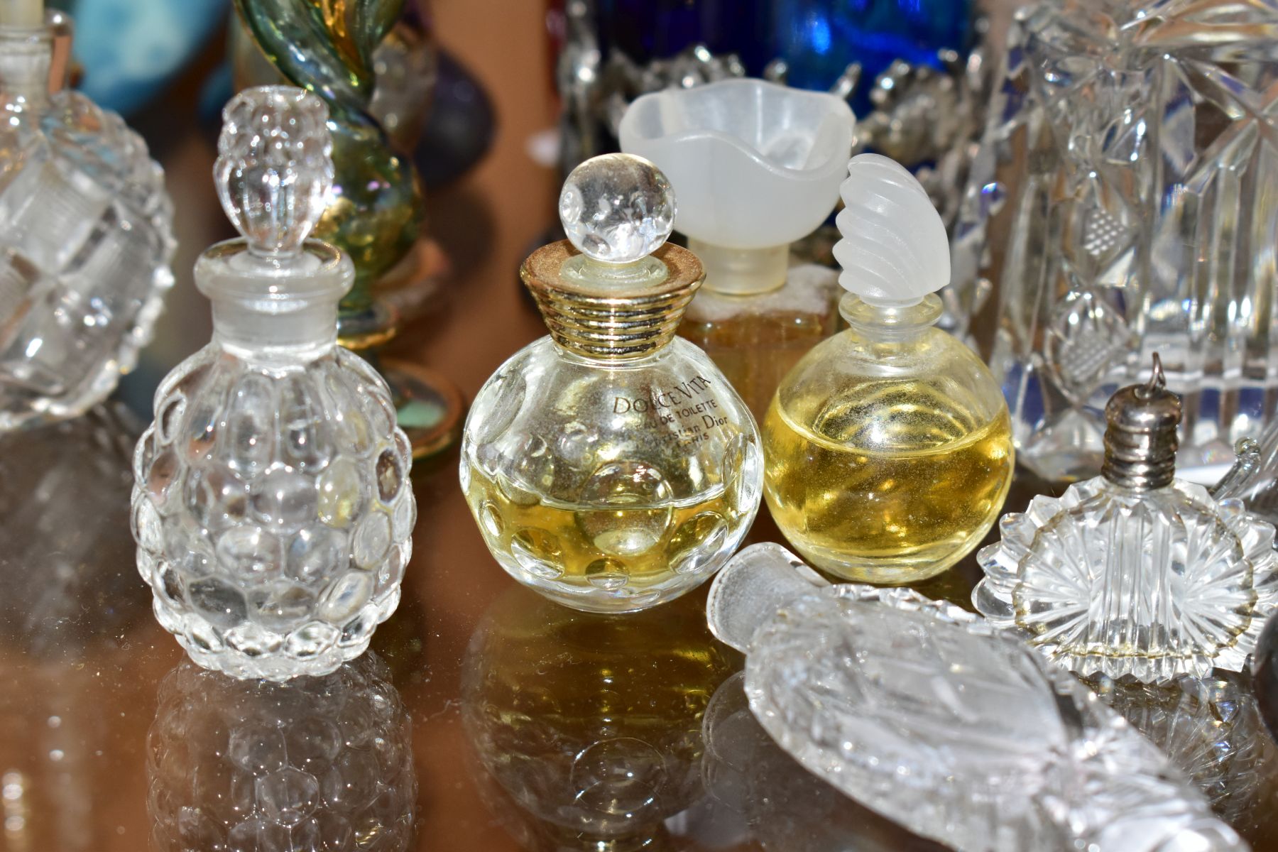 A COLLECTION OF 19TH AND 20TH CENTURY PERFUME BOTTLES , SPARE STOPPERS AND A FUNNEL, mostly glass, - Image 10 of 16