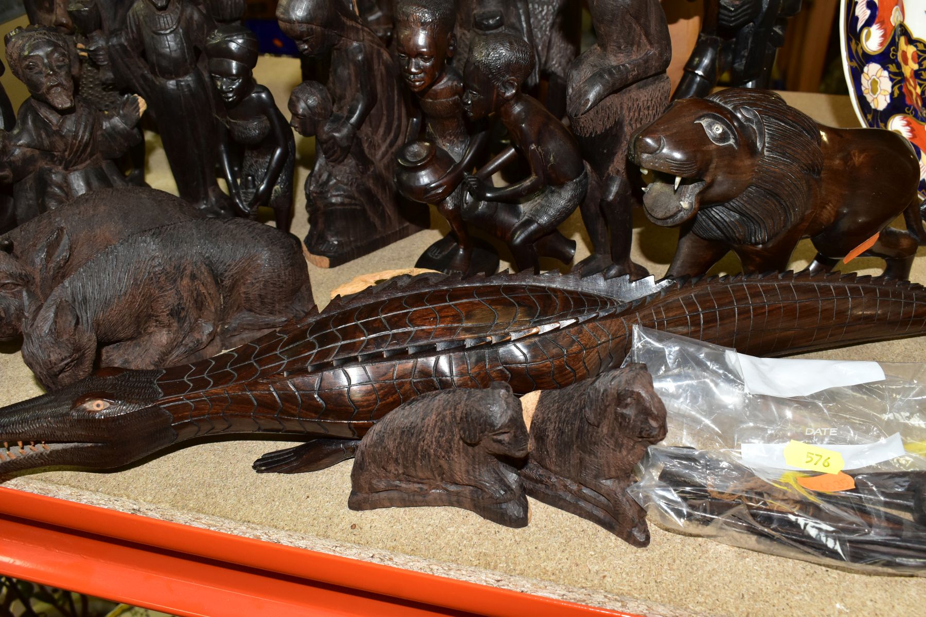 A GROUP OF CARVED HARDWOOD AFRICAN FIGURES, to include a nativity set from Dar-es-Salaam, - Image 2 of 16