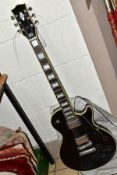 A KAYS ELECTRIC GUITAR, with a bolt on neck and soft case, some strings missing (1)