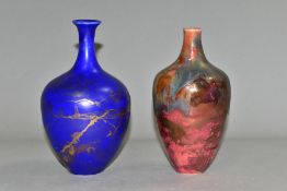 TWO MODERN POTTERY VASES DECORATED WITH LUSTRE GLAZES, comprising a blue ground baluster vase with