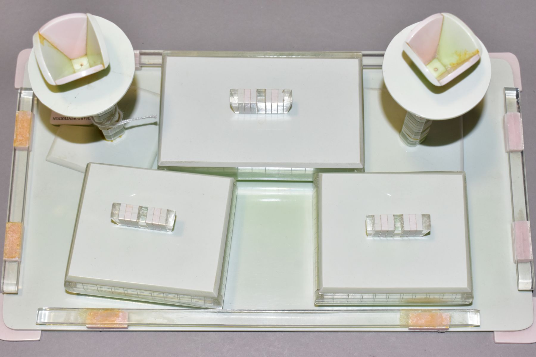 AN ART DECO PINK, GREEN AND CLEAR PLASTIC DRESSING TABLE SET, comprising rectangular tray, a pair of - Image 12 of 12