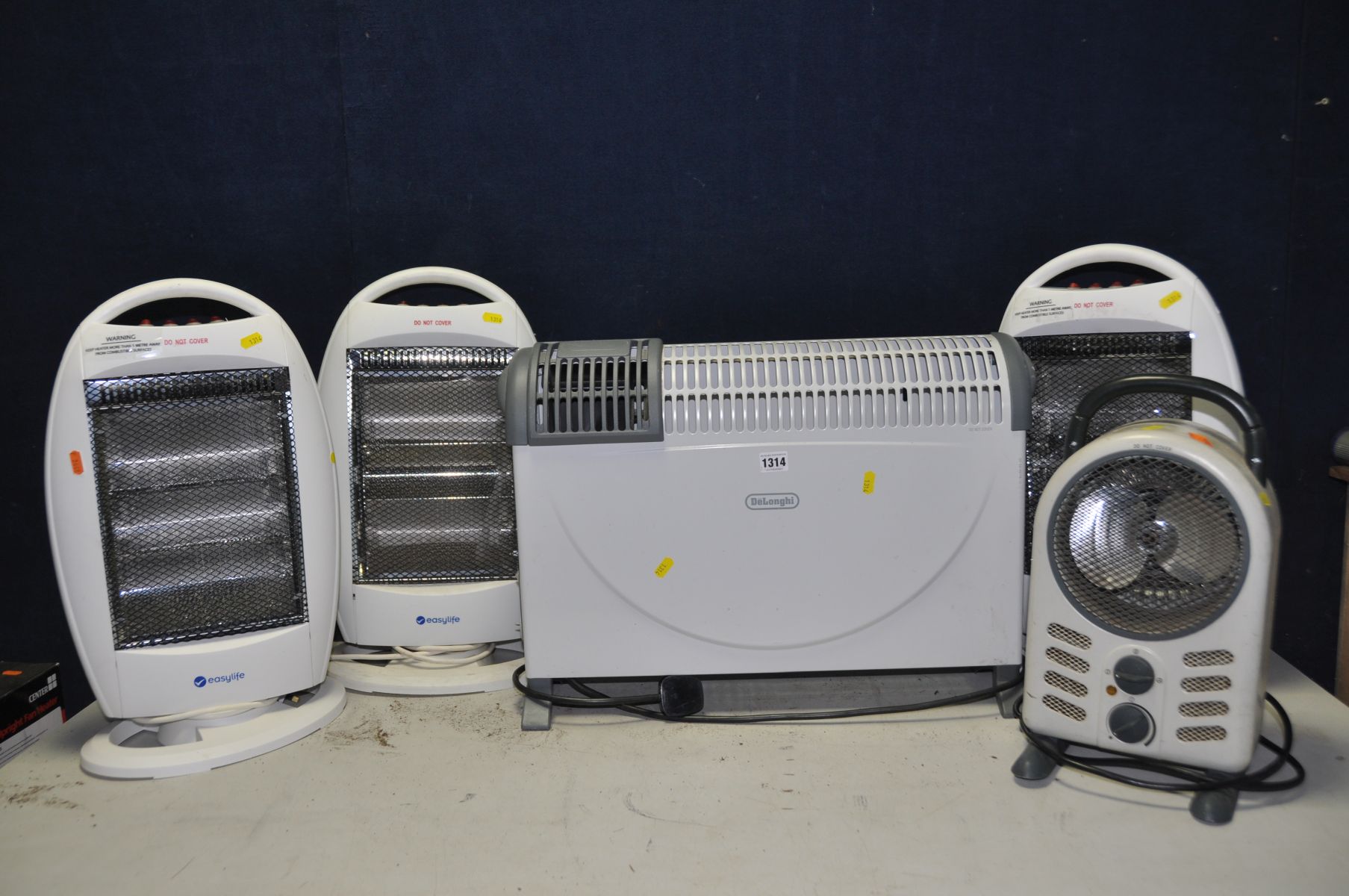 A SELECTION OF HEATERS comprising of three Easylife halogen heaters, two Hotwave blow heaters and