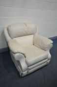 A CREAM LEATHER MANUAL RECLINING ARMCHAIR, and a beige upholstered three seater settee, length 187cm