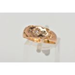 A 15CT GOLD VICTORIAN DIAMOND RING, three old cut diamonds in a starburst setting with scrolling