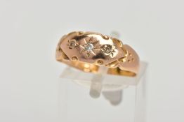 A 15CT GOLD VICTORIAN DIAMOND RING, three old cut diamonds in a starburst setting with scrolling