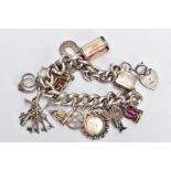 A SILVER CHARM BRACELET AND CHARMS, a thick curb link bracelet, fitted with spring clasp and a heart