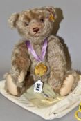 A STEIFF FOR DANBURY MINT 'THE 2006 BEAR', caramel mohair, medallion on ribbon, fully jointed,