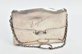 AN EARLY 20TH CENTURY SILVER PURSE, a hard silver purse with a spring hinged fold, engraved with the