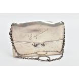 AN EARLY 20TH CENTURY SILVER PURSE, a hard silver purse with a spring hinged fold, engraved with the