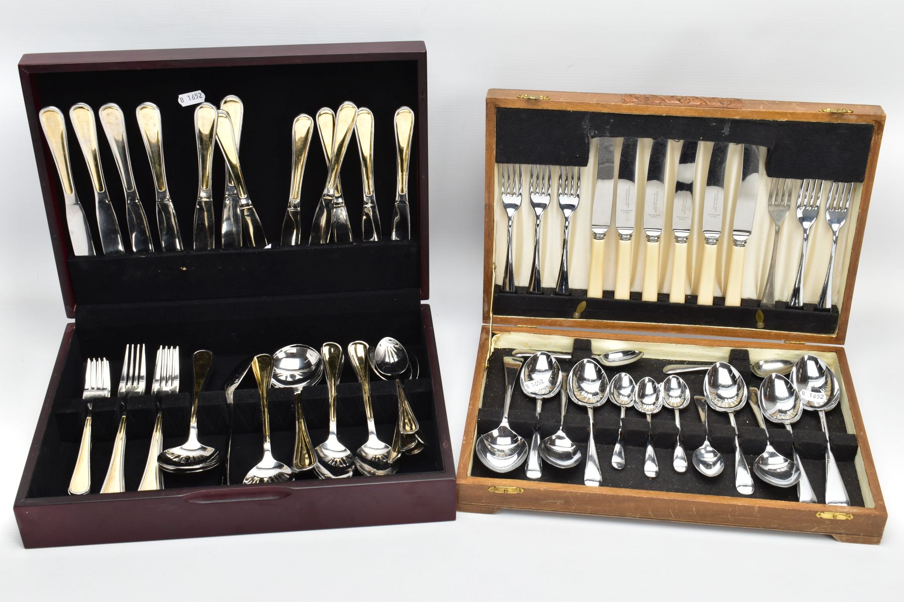 TWO WOODEN CANTEENS OF CUTLERY, to include a complete set of white metal cutlery with yellow metal