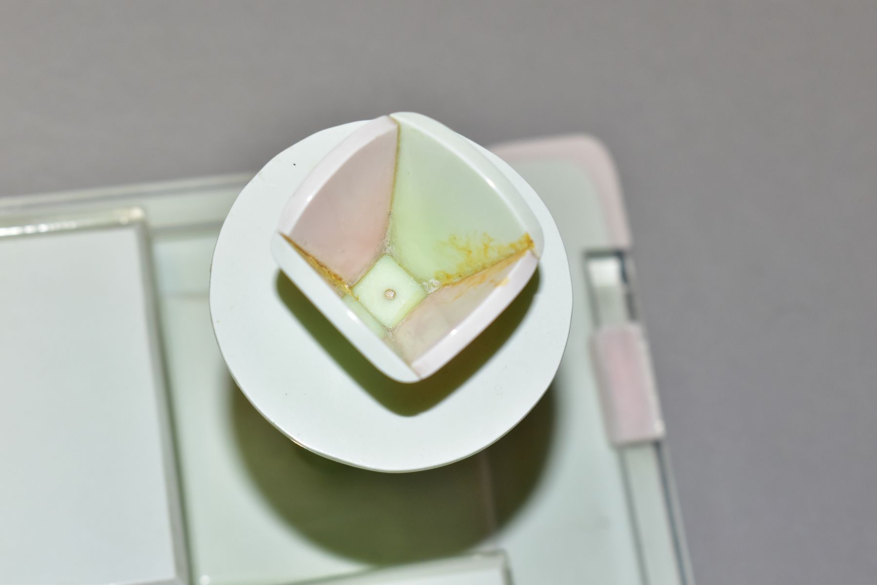 AN ART DECO PINK, GREEN AND CLEAR PLASTIC DRESSING TABLE SET, comprising rectangular tray, a pair of - Image 11 of 12