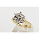 A 9CT GOLD DIAMOND CLUSTER RING, seven round brilliant cut diamonds in a white gold illusion