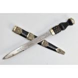A MODERN SCOTTISH PIPERS DIRK, nickel crown pommel set into a basket weave carved ebonised and brass