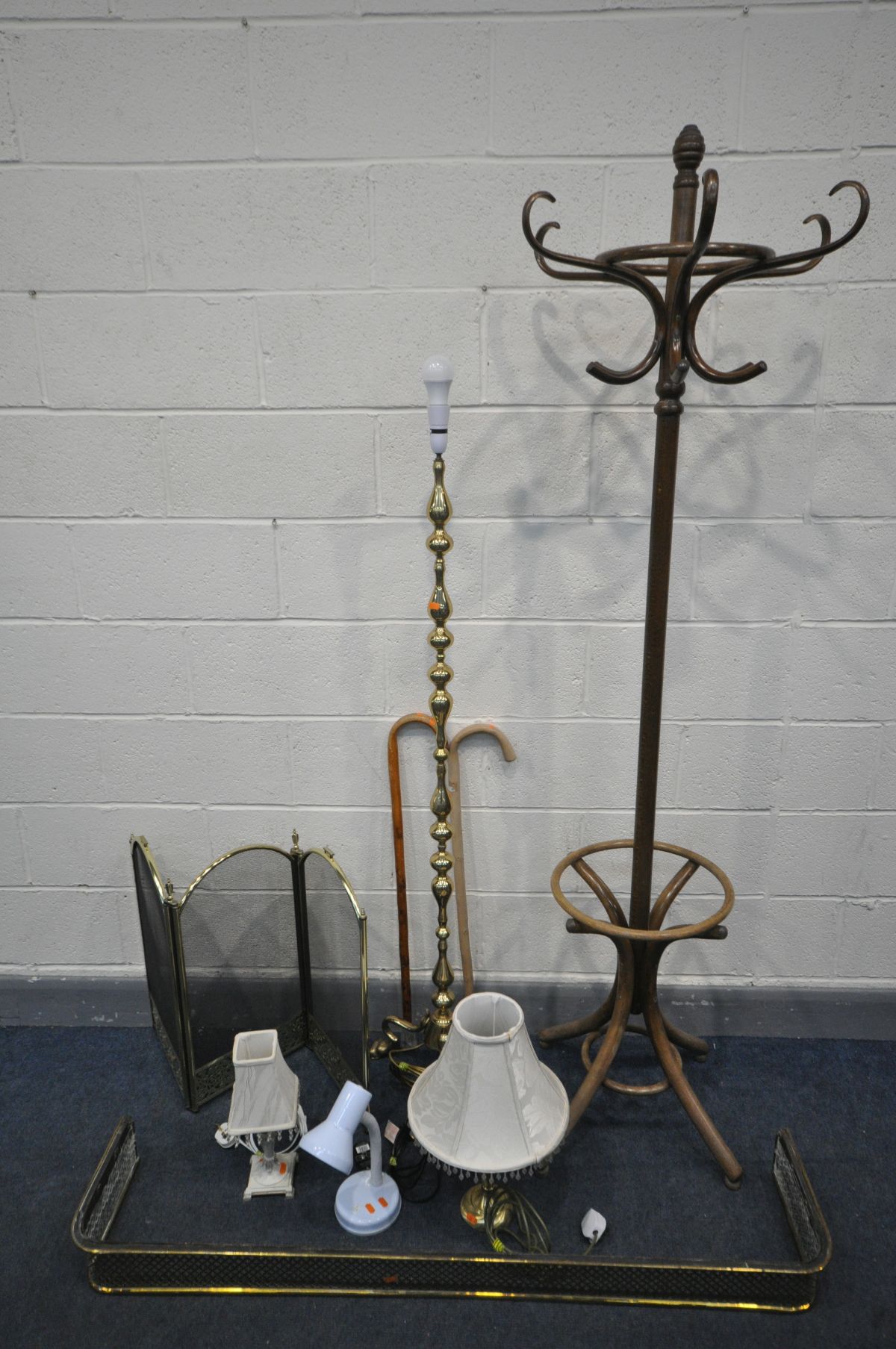 A BENTWOOD STYLE BEECH HAT STAND, along with a brass standard lamp, folding fire screen, brass