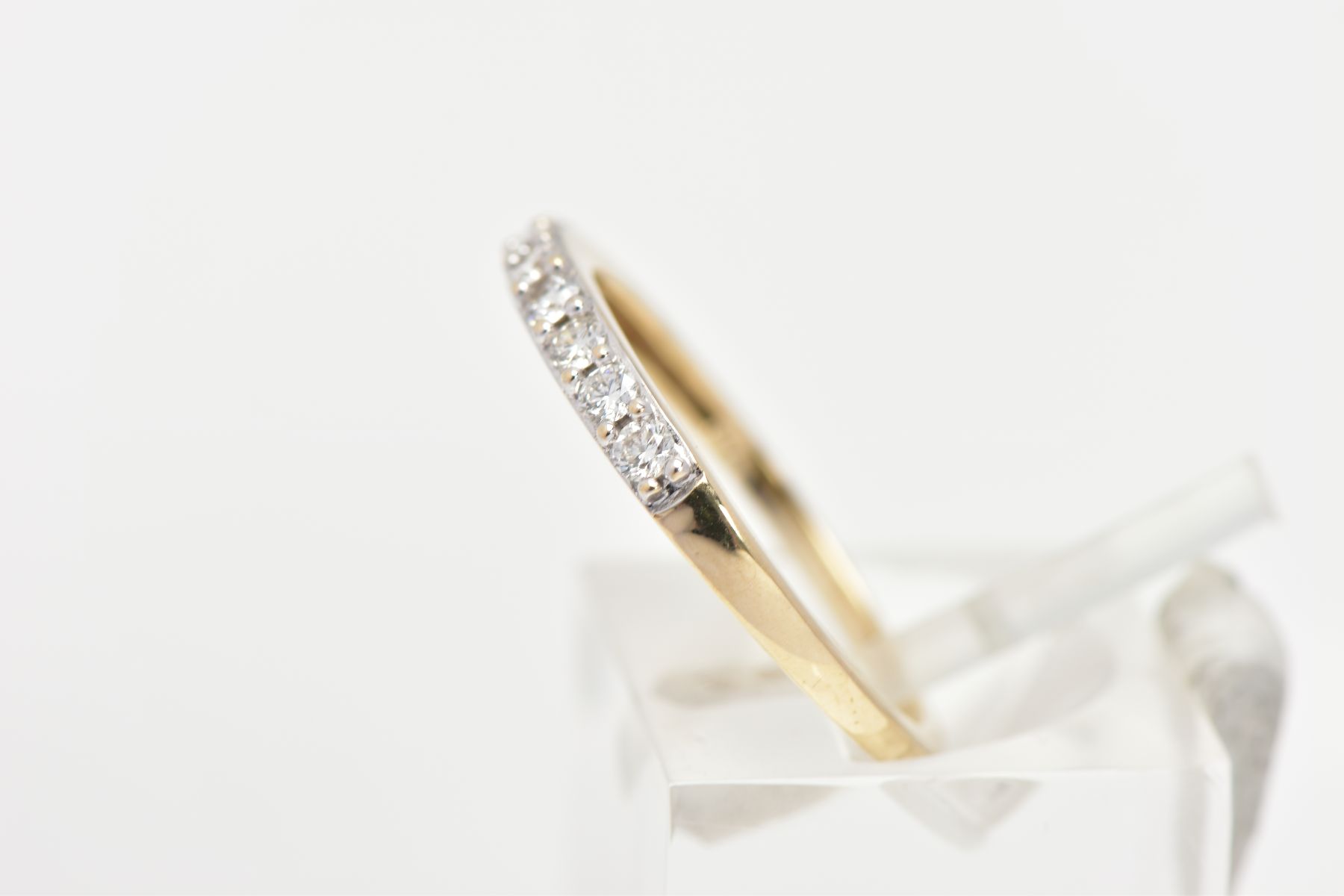 A 9CT GOLD DIAMOND HALF ETERNITY RING, designed with a row of nine claw set round brilliant cut - Image 2 of 4